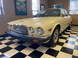 Image result for Nimbus White 1987 Jaguar