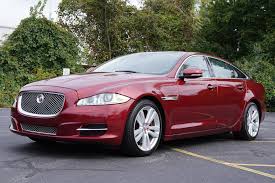 Image result for Carnelian Red 1979 Jaguar