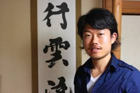 He is instructor Norihito Ishikawa. As soon as I sat down, I was handed a blank sheet of calligraphy paper, a brush and ink. - norihito-ishikawa