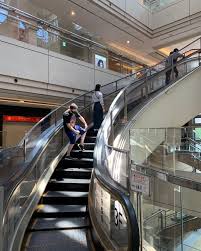 Image result for spiral escalator