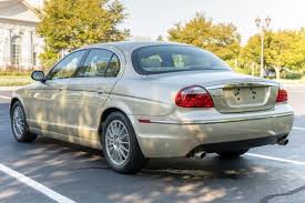 Image result for Winter Gold Pearl 2007 Jaguar