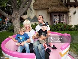 Image result for Queen B by Bumbleride $428 Gwen Stefani and Gavin Rossdale with Kingston and Zuma at the LA zoo