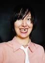 KAREN O WITH GOLD TOOTH.