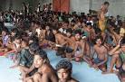 Migrants rescued from sinking boat off Indonesias Aceh - BBC News