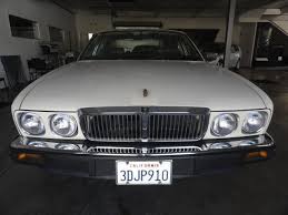 Image result for Glacier White 1988 Jaguar