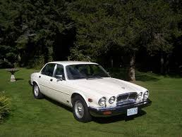 Image result for Nimbus White 1987 Jaguar