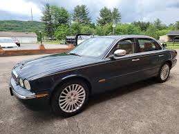 Image result for Black Cherry 2006 Jaguar