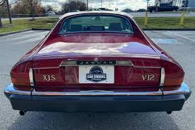 Image result for Sebring Red 1986 Jaguar