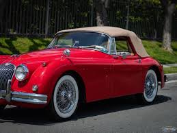 Image result for Carmen Red 1961 Jaguar