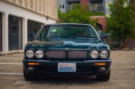 Image result for Alpine Green 1999 Jaguar