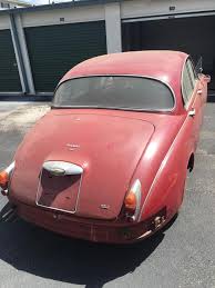 Image result for Maroon 1962 Jaguar