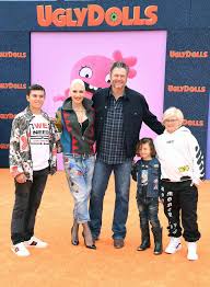 Image result for Queen B by Bumbleride $428 Gwen Stefani and Gavin Rossdale with Kingston and Zuma at the LA zoo