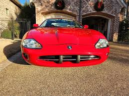 Image result for Phoenix Red 1999 Jaguar