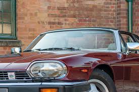 Image result for Sebring Red 1986 Jaguar