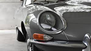 Image result for Maroon 1962 Jaguar