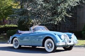 Image result for Silver Blue 1959 Jaguar