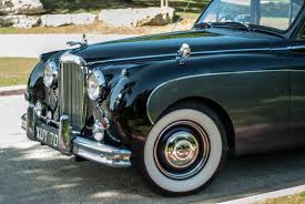 Image result for Dark Green 1959 Jaguar