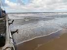 The Irish sea flowing past and under the South pier at Blackpool. - via Daymix