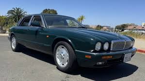 Image result for Bright Turquoise 1995 Jaguar