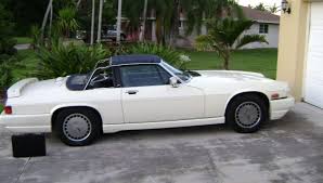 Image result for Nimbus White 1987 Jaguar