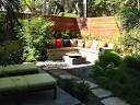 Concrete Corner Wall Seating with Colorful Cushions and Bamboo ...