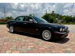 Image result for Black Cherry 2006 Jaguar