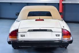 Image result for Nimbus White 1987 Jaguar