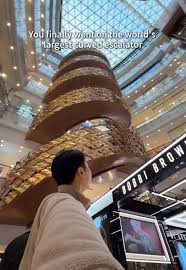 Image result for spiral escalator