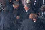 Obama shakes hands with Fidel Castros brother | New York Post