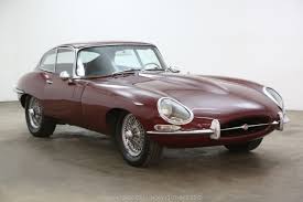 Image result for Maroon 1962 Jaguar