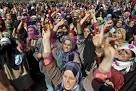 Pakistani flag raised at rally held by Kashmiri separatist Masarat.