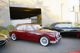 Image result for Maroon 1962 Jaguar