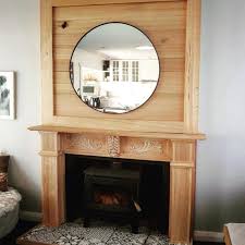 Wood engravings placed above a fireplace