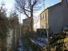 Hygiene, Footpath. Footpath along the front of the terraced houses. - via Daymix
