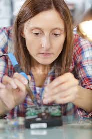 Image result for woman soldering