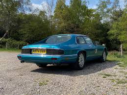 Image result for Bright Turquoise 1995 Jaguar