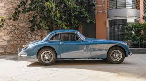 Image result for Silver Blue 1959 Jaguar