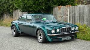 Image result for Turquoise 1973 Jaguar