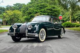 Image result for Dark Green 1959 Jaguar
