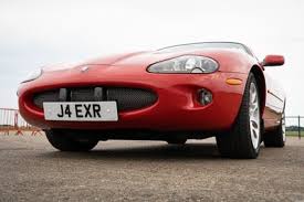 Image result for Phoenix Red 1999 Jaguar
