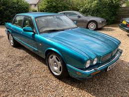 Image result for Turquoise 1973 Jaguar