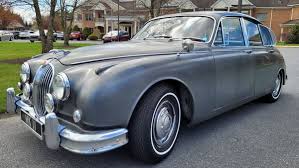 Image result for Silver Blue 1959 Jaguar