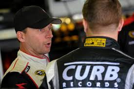 (L-R) Dave Blaney, driver of the #7 Tommy Baldwin Racing Chevrolet, talks with Kevin Swindell, driver of the #30 ... - Kevin%2BSwindell%2BNew%2BHampshire%2BMotor%2BSpeedway%2BYCTpCBUk_6Ll