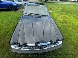 Image result for Poseidon Dark Green 1985 Jaguar