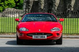 Image result for Phoenix Red 1999 Jaguar