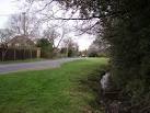 The stream alongside the lane leads down to the River Blackwater. - via Daymix