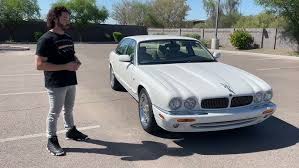 Image result for White Onyx 2002 Jaguar