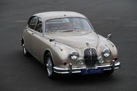 Image result for Golden Sand 1962 Jaguar