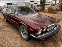 Image result for Burgundy 1983 Jaguar