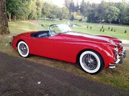 Image result for Carmen Red 1961 Jaguar